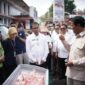 Menteri Pertanian (Mentan) Andi Amran Sulaiman bersama Wakil Menteri Pertanian Sudaryono, melakukan pemantauan Operasi Pasar Pangan Murah. (Dok. Kementan)